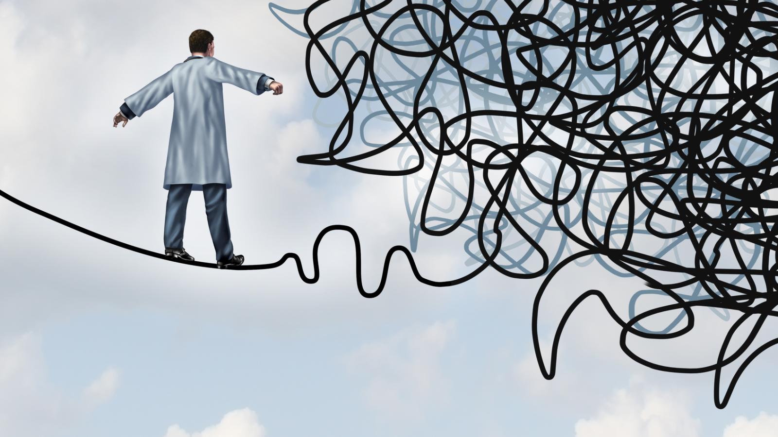 Scientifique sur une corde raide