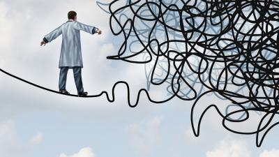 Scientifique sur une corde raide